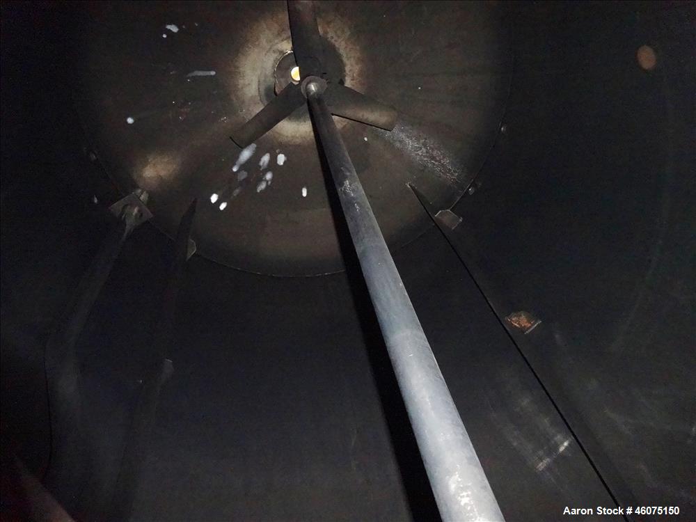 Used Tank, 800 Gallon, 304 Stainless Steel, Vertical. Approximate 60" diameter x 60" straight side, dished top & bottom. Top entering Lightnin agitator, model 71-C-3, serial# 7900275, ratio 9.33 to 1...