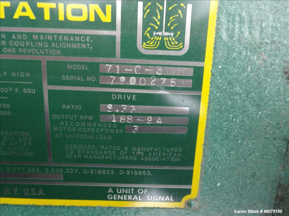 Used Tank, 800 Gallon, 304 Stainless Steel, Vertical. Approximate 60" diameter x 60" straight side, dished top & bottom. Top entering Lightnin agitator, model 71-C-3, serial# 7900275, ratio 9.33 to 1...