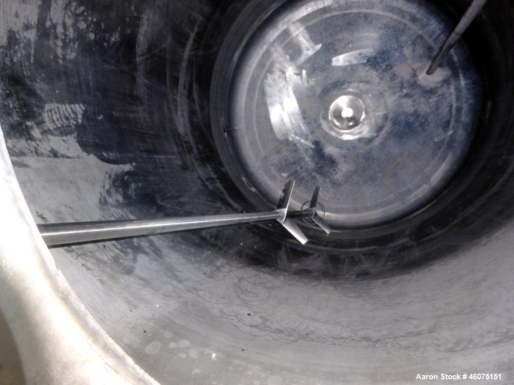 Used Tank, 500 Gallon, 304 Stainless Steel, Vertical. Approximate 48" diameter x 60" straight side, dished top and bottom. Off center top entering Lightnin agitator, model XJCA-33, serial# 97/G09166....