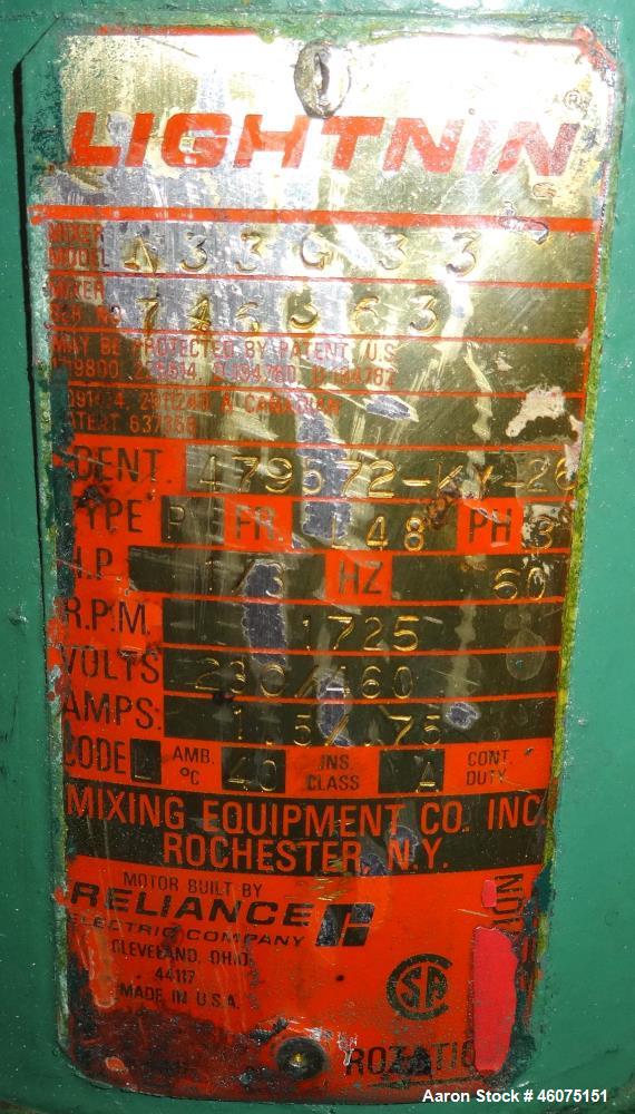Used Tank, 500 Gallon, 304 Stainless Steel, Vertical. Approximate 48" diameter x 60" straight side, dished top and bottom. Off center top entering Lightnin agitator, model XJCA-33, serial# 97/G09166....