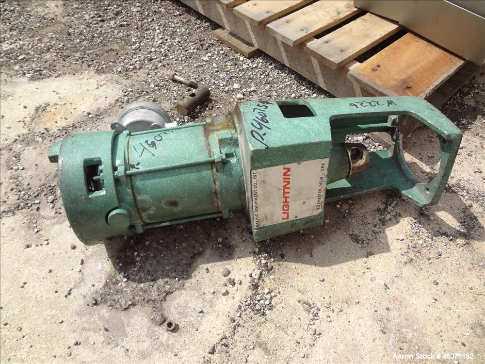 Used Tank, 500 Gallon, 304 Stainless Steel, Vertical. Approximate 48" diameter x 60" straight side, dished top & bottom. Off center top entering Lightnin agitator, model N33G33, serial# 746364. Shaft...