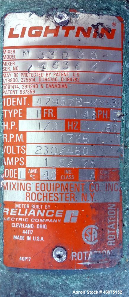 Used Tank, 500 Gallon, 304 Stainless Steel, Vertical. Approximate 48" diameter x 60" straight side, dished top & bottom. Off center top entering Lightnin agitator, model N33G33, serial# 746364. Shaft...