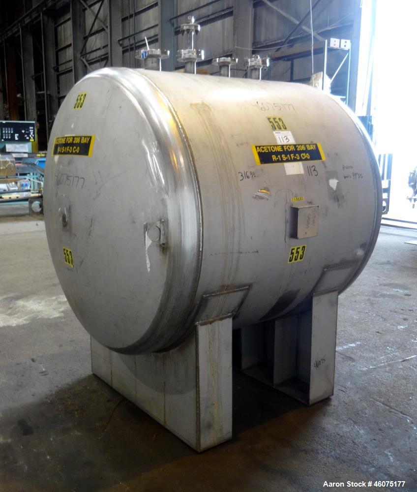 Used Tank, 700 Gallon, 316 Stainless Steel, Horizontal. Approximate 60" diameter x 49" straight side, dished ends. Openings Top: (1) 3", (3) 2". Side: 16" man way with cover. 1-1/2" Center bottom out...