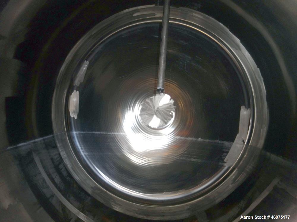 Used Tank, 700 Gallon, 316 Stainless Steel, Horizontal. Approximate 60" diameter x 49" straight side, dished ends. Openings Top: (1) 3", (3) 2". Side: 16" man way with cover. 1-1/2" Center bottom out...