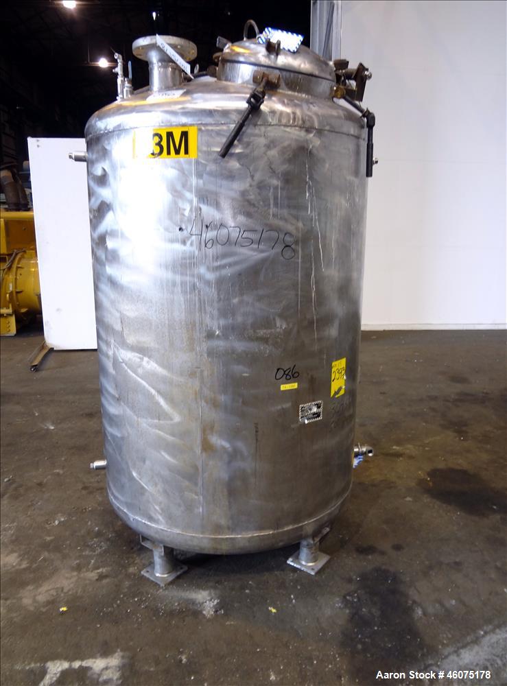 Used Tank, 500 Gallon, 304 Stainless Steel, Vertical. Approximate 48" diameter x 60" straight side, dished top & bottom. Off center top entering Lightnin agitator, model EKXJSS-200, serial# 98/G25854...