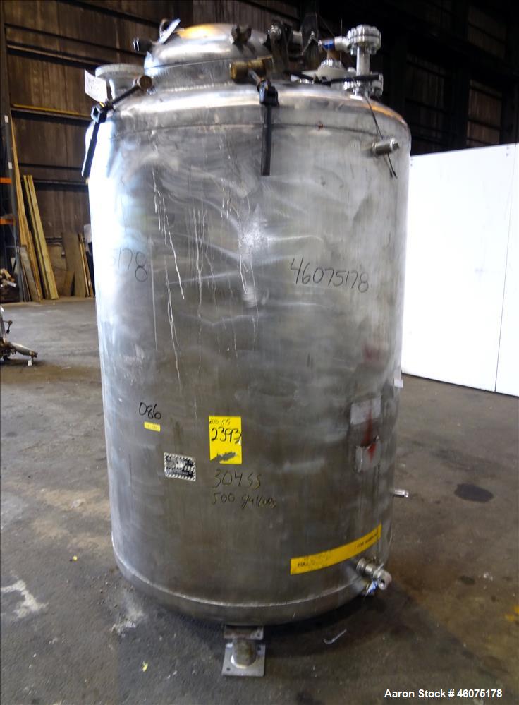 Used Tank, 500 Gallon, 304 Stainless Steel, Vertical. Approximate 48" diameter x 60" straight side, dished top & bottom. Off center top entering Lightnin agitator, model EKXJSS-200, serial# 98/G25854...