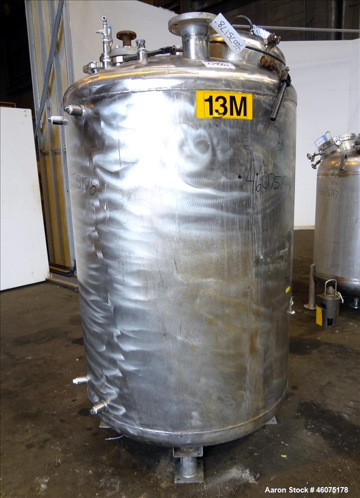 Used Tank, 500 Gallon, 304 Stainless Steel, Vertical. Approximate 48" diameter x 60" straight side, dished top & bottom. Off center top entering Lightnin agitator, model EKXJSS-200, serial# 98/G25854...