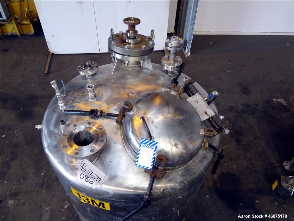 Used Tank, 500 Gallon, 304 Stainless Steel, Vertical. Approximate 48" diameter x 60" straight side, dished top & bottom. Off center top entering Lightnin agitator, model EKXJSS-200, serial# 98/G25854...