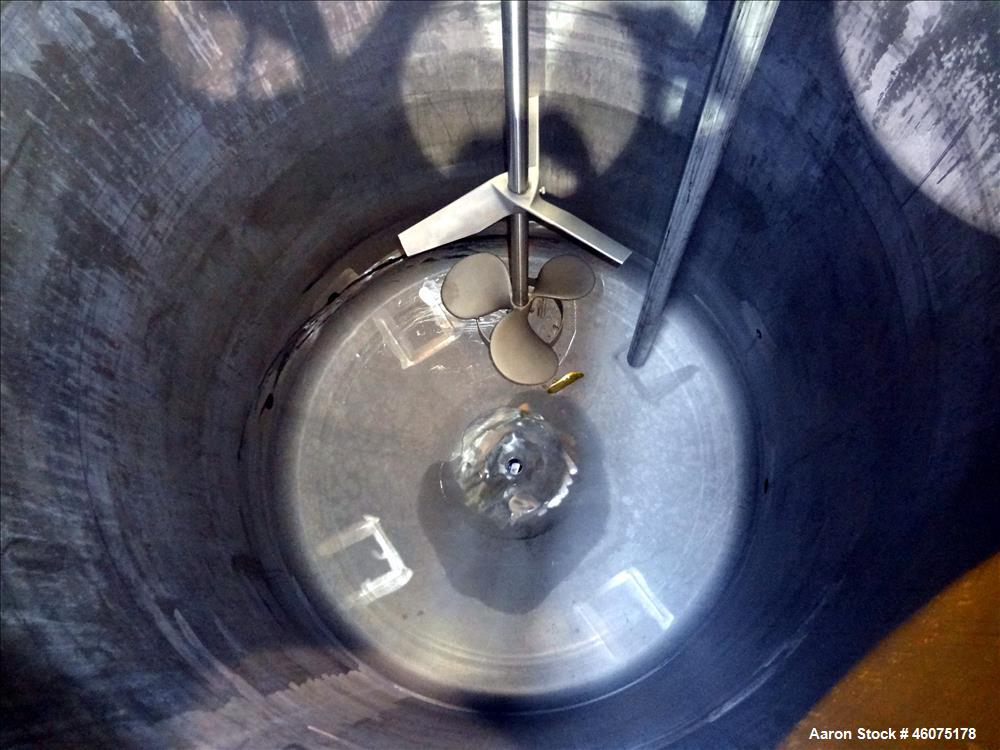 Used Tank, 500 Gallon, 304 Stainless Steel, Vertical. Approximate 48" diameter x 60" straight side, dished top & bottom. Off center top entering Lightnin agitator, model EKXJSS-200, serial# 98/G25854...