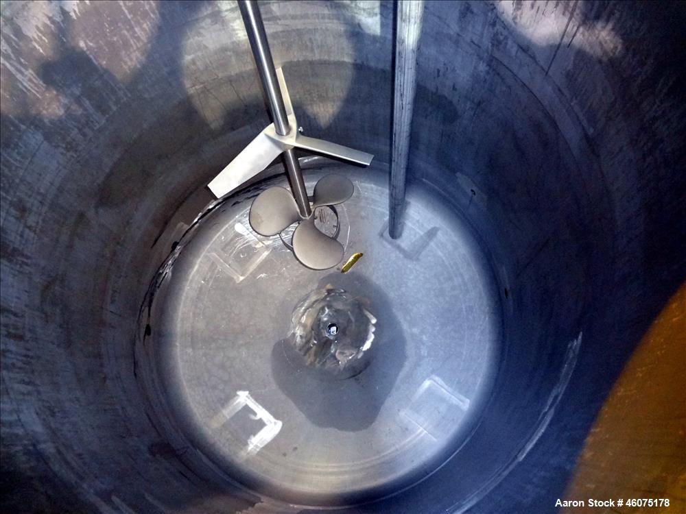 Used Tank, 500 Gallon, 304 Stainless Steel, Vertical. Approximate 48" diameter x 60" straight side, dished top & bottom. Off center top entering Lightnin agitator, model EKXJSS-200, serial# 98/G25854...