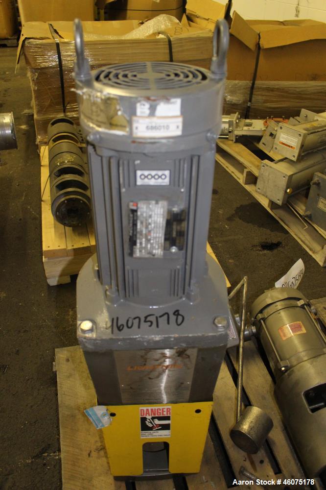 Used Tank, 500 Gallon, 304 Stainless Steel, Vertical. Approximate 48" diameter x 60" straight side, dished top & bottom. Off center top entering Lightnin agitator, model EKXJSS-200, serial# 98/G25854...