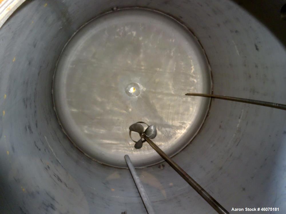 Used Tank, 775 Gallon, 316 Stainless Steel, Vertical. Approximate 60" diameter x 57" straight side, dished top & bottom. Off center top entering air operated Lightnin agitator. Shaft with 3 blade tur...