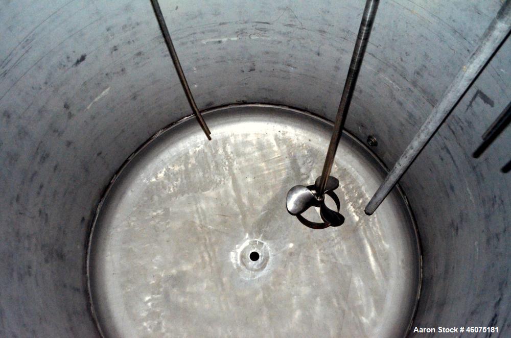 Used Tank, 775 Gallon, 316 Stainless Steel, Vertical. Approximate 60" diameter x 57" straight side, dished top & bottom. Off center top entering air operated Lightnin agitator. Shaft with 3 blade tur...