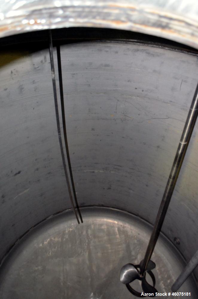Used Tank, 775 Gallon, 316 Stainless Steel, Vertical. Approximate 60" diameter x 57" straight side, dished top & bottom. Off center top entering air operated Lightnin agitator. Shaft with 3 blade tur...