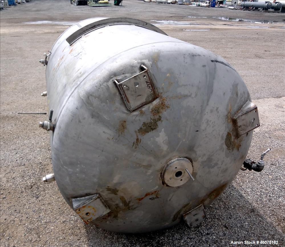 Used Tank, 500 Gallon, 304 Stainless Steel, Vertical. Approximate 48" diameter x 60" straight side, dished top & bottom. Top openings: 15" man way with cover, 8", 3", 3" sight glass, 3" center bottom...