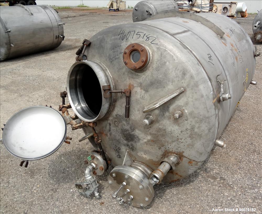 Used Tank, 500 Gallon, 304 Stainless Steel, Vertical. Approximate 48" diameter x 60" straight side, dished top & bottom. Top openings: 15" man way with cover, 8", 3", 3" sight glass, 3" center bottom...