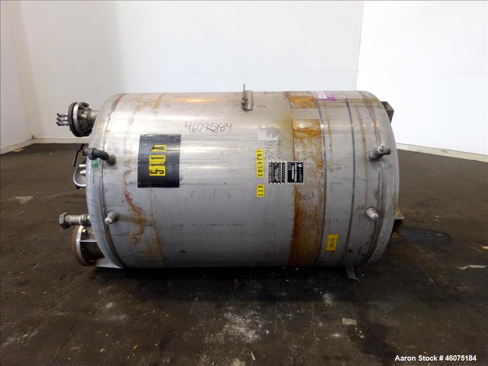 Used Tank, 500 Gallon, 304 Stainless Steel, Vertical. Approximate 48" diameter x 60" straight side, dished top and bottom. Openings Top: 18" man way with hinged cover, (1) 8", (1) 4-1/2", (3) 2". 3-1...
