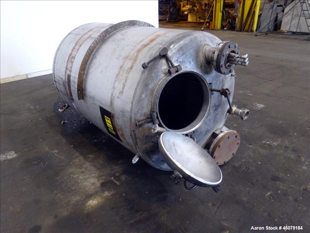 Used Tank, 500 Gallon, 304 Stainless Steel, Vertical. Approximate 48" diameter x 60" straight side, dished top and bottom. Openings Top: 18" man way with hinged cover, (1) 8", (1) 4-1/2", (3) 2". 3-1...