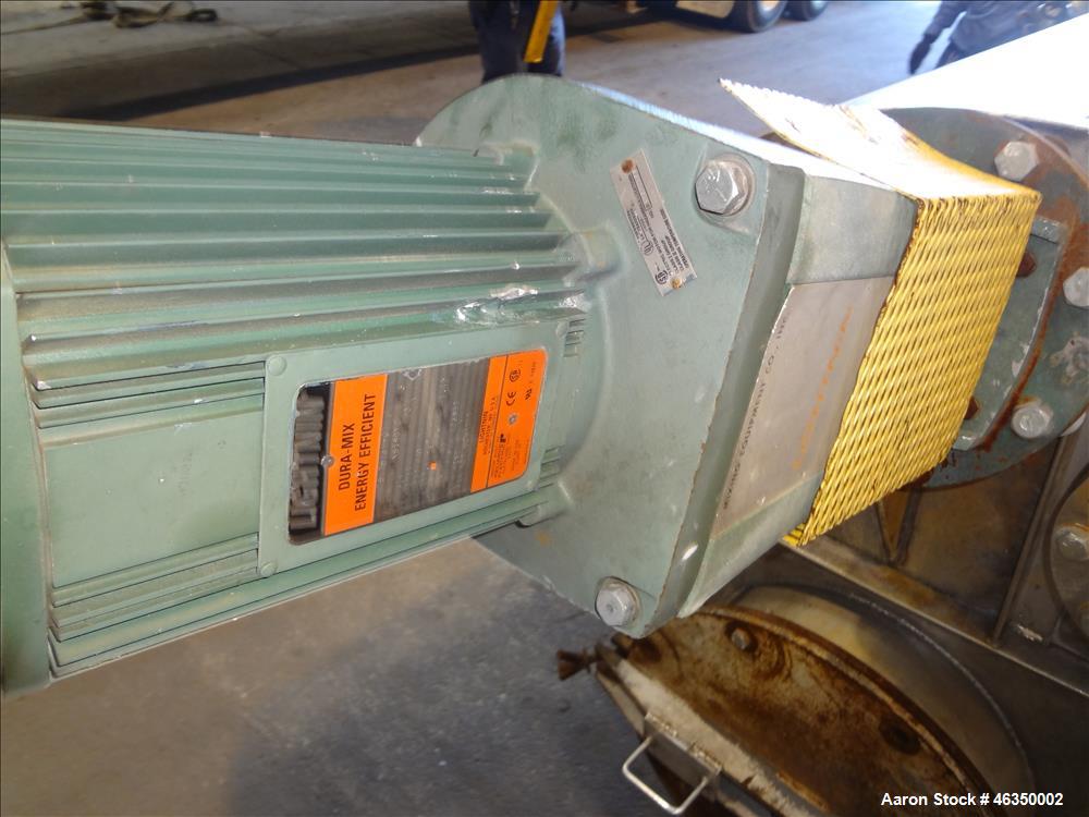 Used Tank, Approximately 750 Gallons, 304 Stainless Steel, Vertical. Approximately 48" diameter x 96" straight side. Dish top, jacketed 20" cone bottom, no rating. Top mounted off center Lightnin agi...