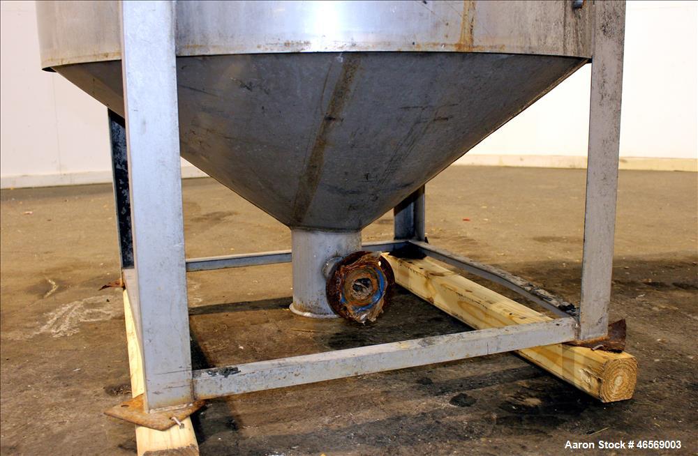 Used Tank, Approximate 700 Gallon, 304 Stainless Steel, Vertical. 48" Diameter x 82" straight side. Flat welded top, cone bottom. Openings Top: (1) 18", (2) 2". Side (1) 4", (5) 1". 2" Center bottom ...