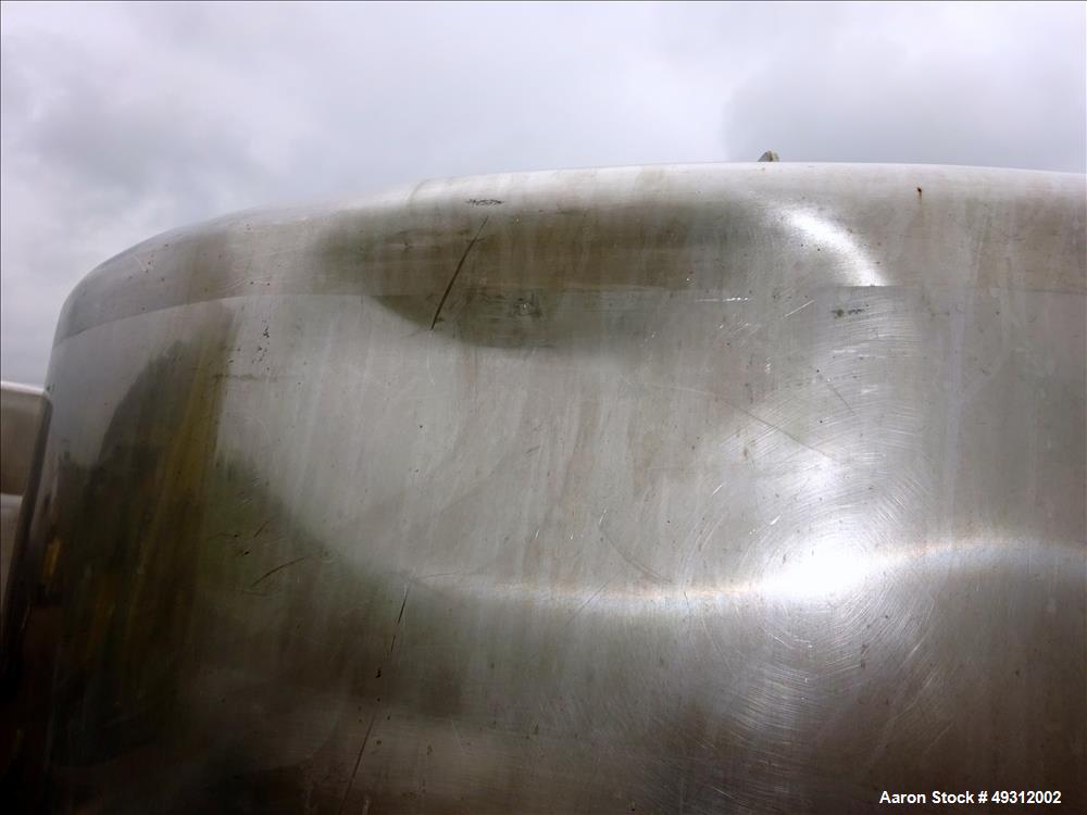 Used Tank, 500 Gallon, Stainless Steel, Vertical. Approximate 52" diameter x 54" straight side, flet top, coned bottom. Openings top 20" manway with cover, 4", side bottom 3", approximate 2" tangenti...