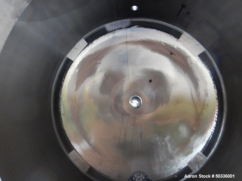Used Tank, Approximately 845 Gallon, Stainless Steel, Vertical. Approximately 72" diameter x 48" straight side, dish top and bottom. Polished internal. Top, center manway. Center bottom outlet. Mount...