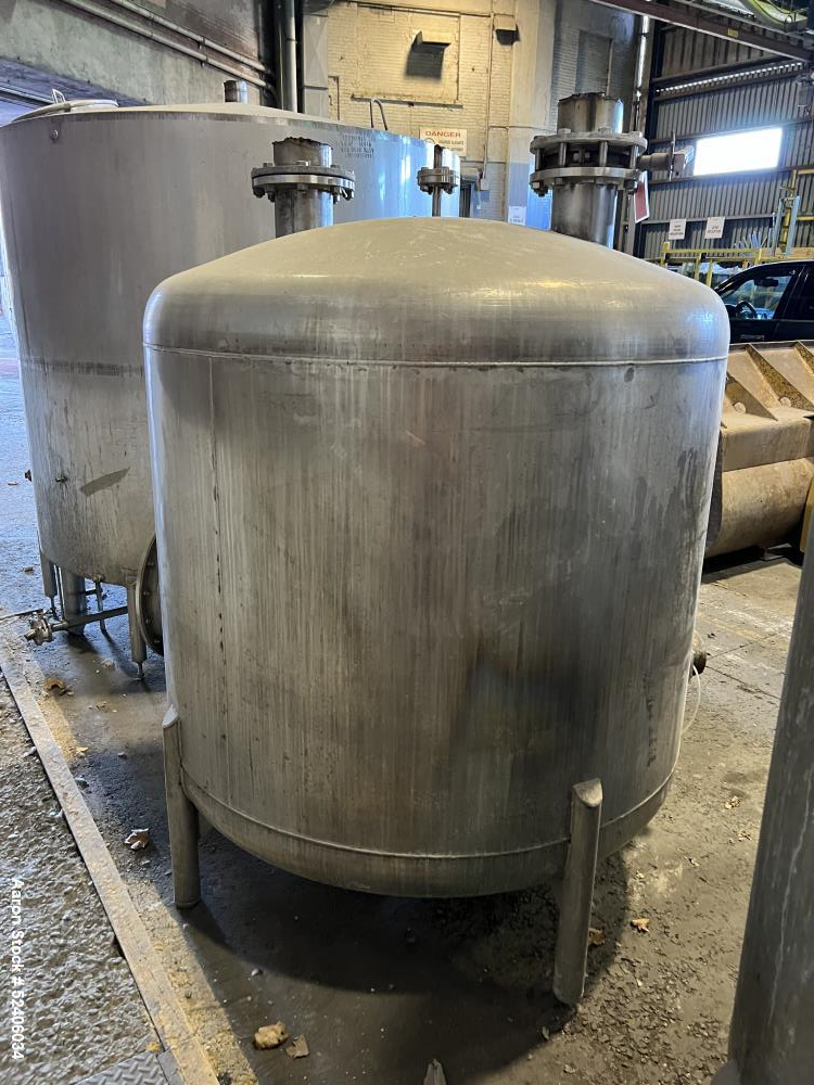 Used Tank, Approximate 550 Gallon, Stainless Steel, Vertical. Approximate 60" diameter x 42" straight side, dished top & bottom. Mounted on 4 stainless legs.