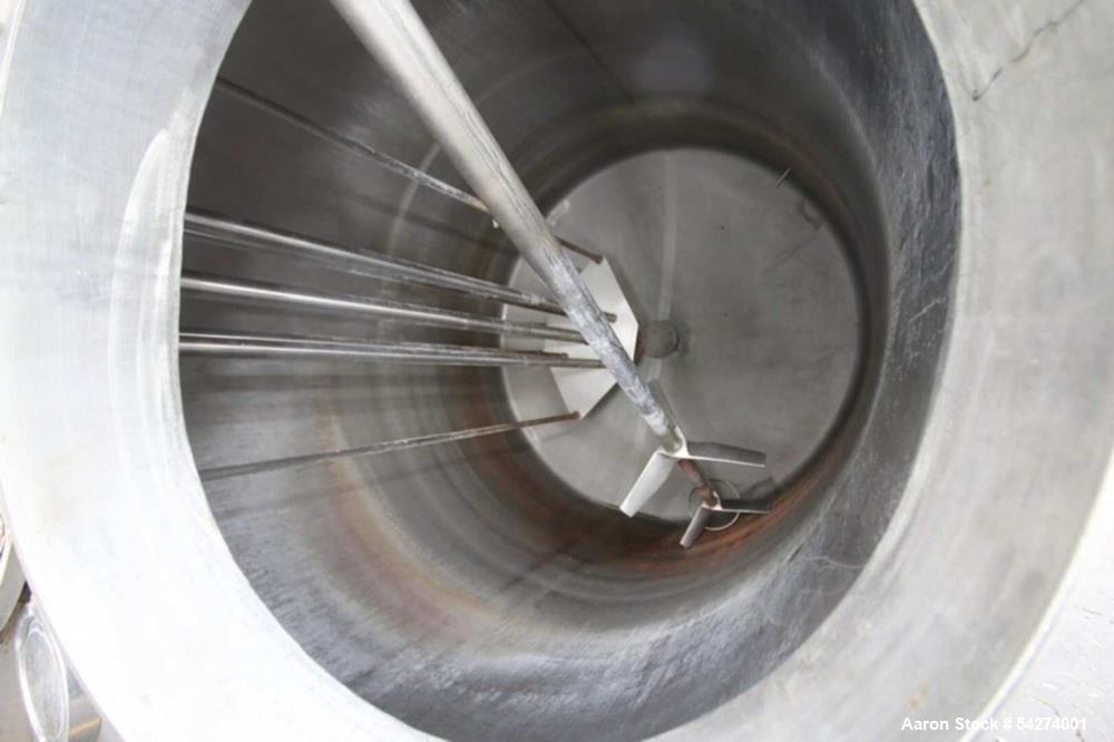 Used Aprox. 800 Gal. Dome Top, Dome Bottom S/S Tank, Single Wall, with(2) Vertical Agitator Shaft (Note: Drive Motor Not Included) & Lightnin Agitator, with Top Man Door, (4) 2" Ct Tope connection & ...