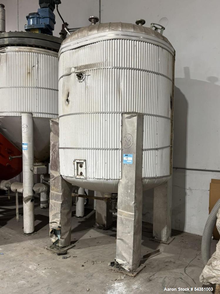 Used Approximate 900 Gallon Stainless Steel Tank. Approximate 60" diameter x 72" straight side, dished top & bottom. Mounted on 4 legs.