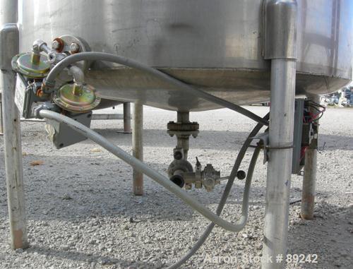 USED: Tank, 550 gallon, 316 stainless steel, vertical. 50" diameter x 64" straight side. Flat top, slight coned bottom. Openings: top (5) 1-1/2", 17" manway with cover, approximate 1-1/2" center bott...