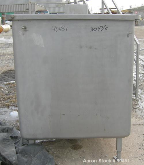 Used: Tank, 490 gallon, 304 stainless steel, rectangular. 42" wide x 60" long x 45" deep. Open top with a 1 piece hinged cover, flat bottom. 2" tri calmp end bottom oulet. Mounted on 4 stainless stee...