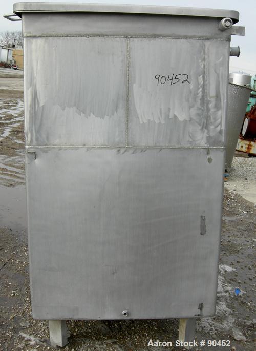 Used: Tank, 730 gallon, 304 stainless steel, rectangular. 42" wide x 60" long x 67" deep. Open top with a 1 piece hinged cover, flat bottom. 10" x 10" side opening,2" tri calmp end bottom oulet. Moun...