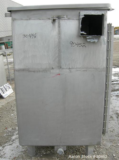 Used: Tank, 730 gallon, 304 stainless steel, rectangular. 42" wide x 60" long x 67" deep. Open top with a 1 piece hinged cover, flat bottom. 10" x 10" side opening,2" tri calmp end bottom oulet. Moun...