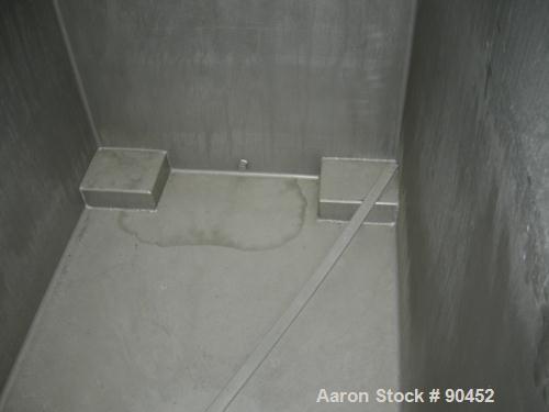 Used: Tank, 730 gallon, 304 stainless steel, rectangular. 42" wide x 60" long x 67" deep. Open top with a 1 piece hinged cover, flat bottom. 10" x 10" side opening,2" tri calmp end bottom oulet. Moun...