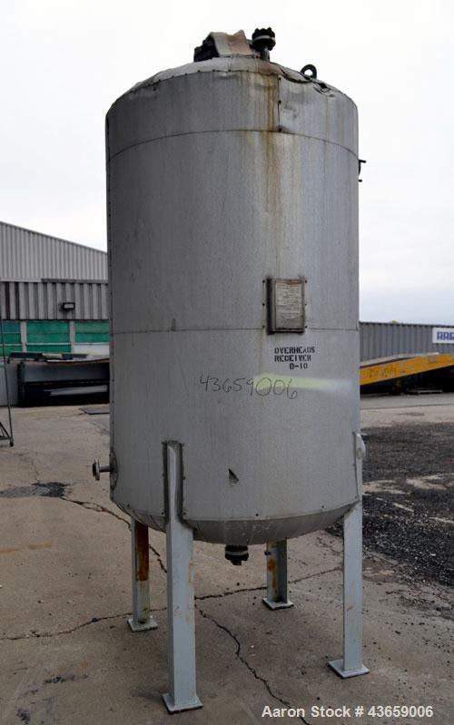 Used Arrow Tank & Engineering Pressure Tank, 570 Gallons, 304L Stainless Steel, Vertical. Approximate 48” diameter x 68” straight side, dished top and bottom. Internal rated Full Vacuum & 50psi at -2...