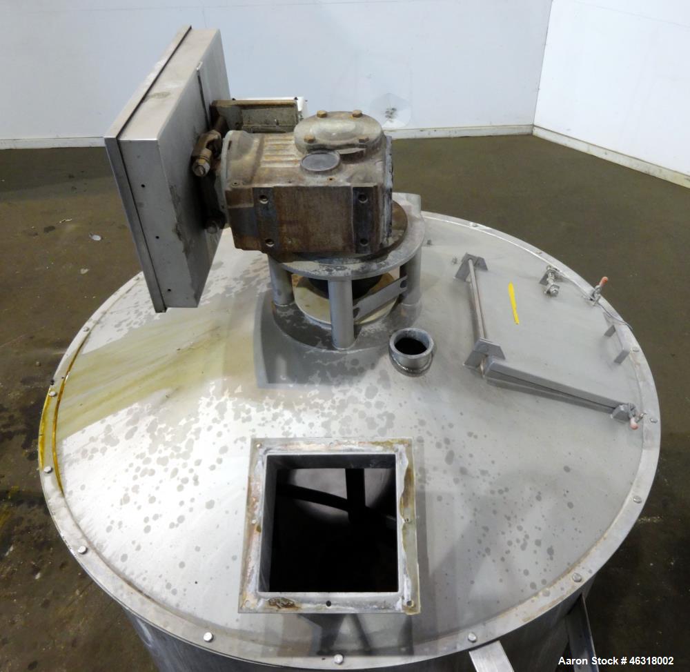 Used Blentech Tank, Model Tank 850-A, Approximately 650 Gallons, 304 Stainless Steel, Vertical. 72" Diameter x 34" straight side. Bolt on coned top, coned bottom. Agitated with flat bar style agitato...
