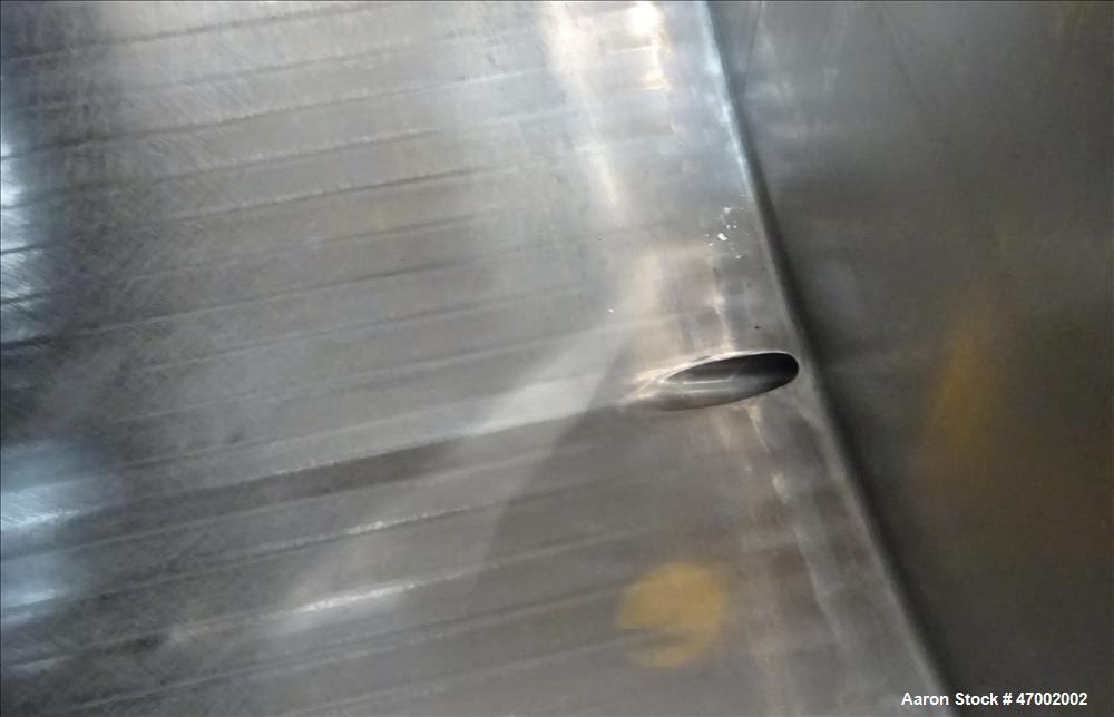 Used C.E. Howard Milk Tank, Model H-58, 800 Gallons, 304 Stainless Steel, Horizontal. U-shaped trough approximate 92-1/2" long x 60" wide x 38" deep. Bottom cooling coils (no cooler). (2) Top hinged ...