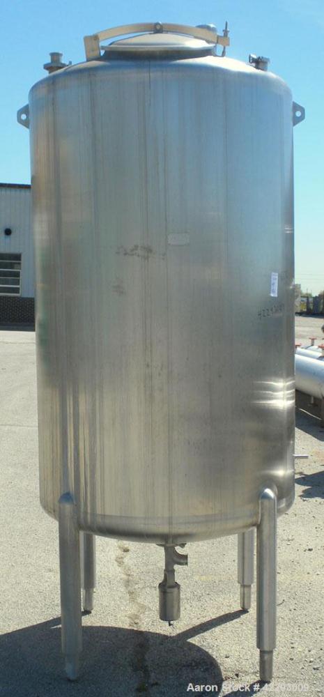 Used Cherry Burrell Tank, 600 gallon, 316 stainless steel, vertical. 48" Diameter x 72" straight side, dish top and bottom. Internal CIP spray ball. Top openings: 18" manway with cover, 3" sanitary, ...
