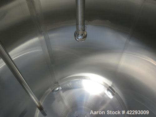 Used Cherry Burrell Tank, 600 gallon, 316 stainless steel, vertical. 48" Diameter x 72" straight side, dish top and bottom. Internal CIP spray ball. Top openings: 18" manway with cover, 3" sanitary, ...