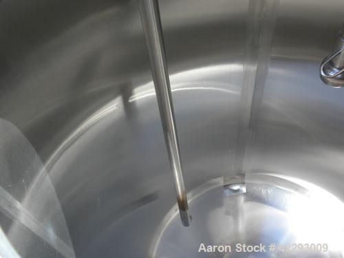 Used Cherry Burrell Tank, 600 gallon, 316 stainless steel, vertical. 48" Diameter x 72" straight side, dish top and bottom. Internal CIP spray ball. Top openings: 18" manway with cover, 3" sanitary, ...