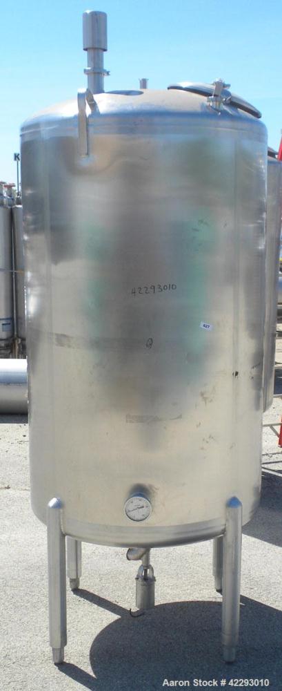 Used Cherry Burrell Tank, 600 gallon, 316L stainless steel, vertical. 48" Diameter x 72" straight side, dish top and bottom. Internal CIP spray ball. Top openings: 18" manway with cover, 3" sanitary,...