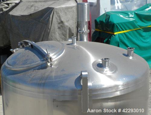 Used Cherry Burrell Tank, 600 gallon, 316L stainless steel, vertical. 48" Diameter x 72" straight side, dish top and bottom. Internal CIP spray ball. Top openings: 18" manway with cover, 3" sanitary,...