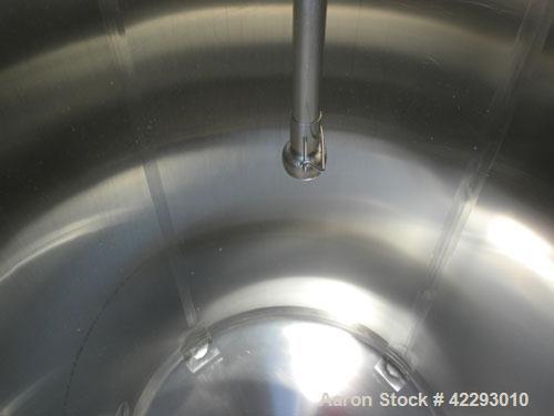 Used Cherry Burrell Tank, 600 gallon, 316L stainless steel, vertical. 48" Diameter x 72" straight side, dish top and bottom. Internal CIP spray ball. Top openings: 18" manway with cover, 3" sanitary,...