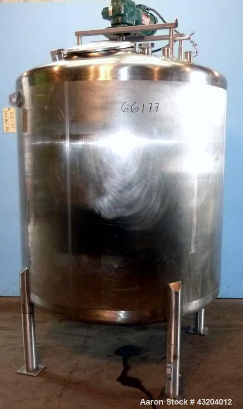 Used Cherry Burrell Tank, 750 Gallon, Stainless Steel, Vertical.  60" Diameter x 55-1/2" straight side, dished top and bottom.  Stainless steel agitator bridge with a 1-1/2 hp, 1730 rpm drive with a ...