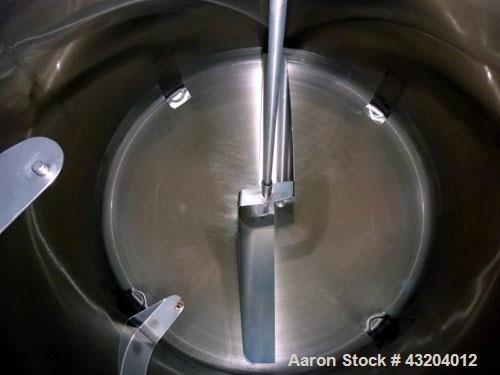 Used Cherry Burrell Tank, 750 Gallon, Stainless Steel, Vertical.  60" Diameter x 55-1/2" straight side, dished top and bottom.  Stainless steel agitator bridge with a 1-1/2 hp, 1730 rpm drive with a ...