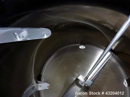 Used Cherry Burrell Tank, 750 Gallon, Stainless Steel, Vertical.  60" Diameter x 55-1/2" straight side, dished top and bottom.  Stainless steel agitator bridge with a 1-1/2 hp, 1730 rpm drive with a ...