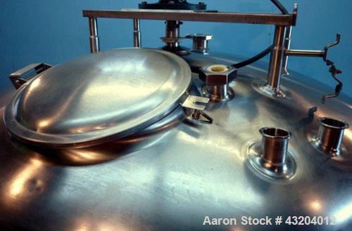 Used Cherry Burrell Tank, 750 Gallon, Stainless Steel, Vertical.  60" Diameter x 55-1/2" straight side, dished top and bottom.  Stainless steel agitator bridge with a 1-1/2 hp, 1730 rpm drive with a ...