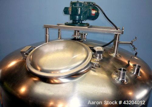 Used Cherry Burrell Tank, 750 Gallon, Stainless Steel, Vertical.  60" Diameter x 55-1/2" straight side, dished top and bottom.  Stainless steel agitator bridge with a 1-1/2 hp, 1730 rpm drive with a ...