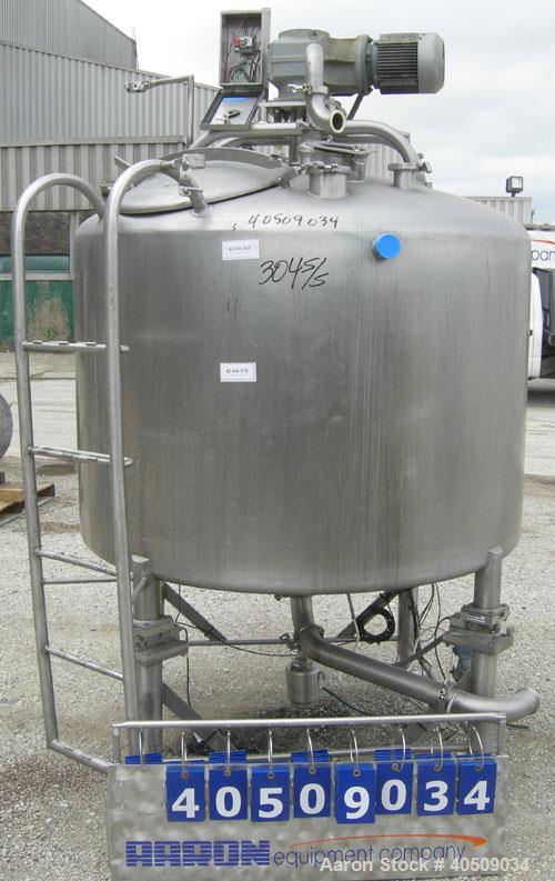 Used Creamery Package Tank, 500 Gallon, 304 stainless steel, vertical. 60" diameter x 39" straight side. Dished top, coned bottom. Fixed stainless steel agitator bridge, bottom supported anchor agita...