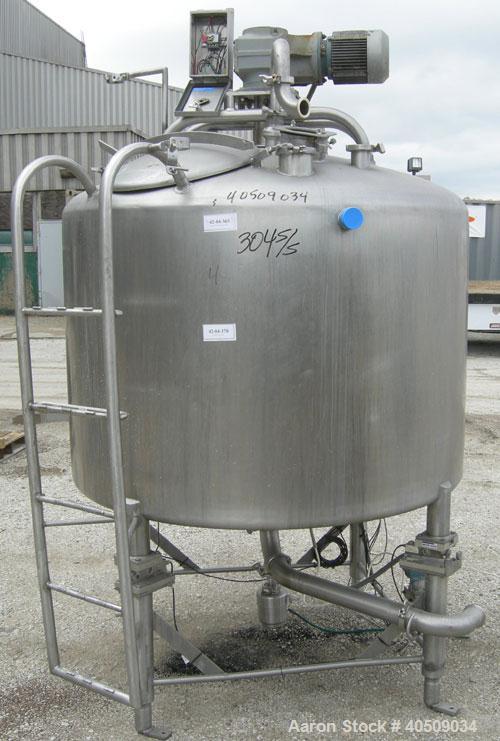 Used Creamery Package Tank, 500 Gallon, 304 stainless steel, vertical. 60" diameter x 39" straight side. Dished top, coned bottom. Fixed stainless steel agitator bridge, bottom supported anchor agita...